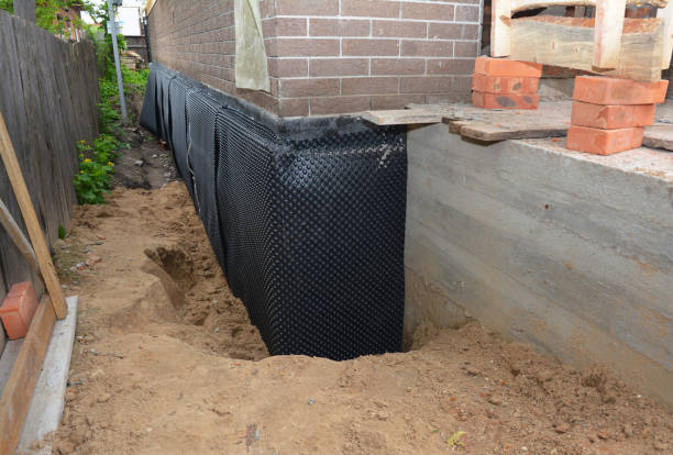 SJ Waterproofing Pros technician performing targeted Sump Pump Installation assessment in Edison, NJ